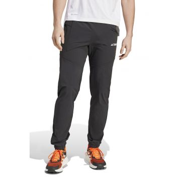 Pantaloni cu buzunare laterale pentru alergare - Negru