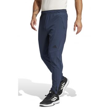 Pantaloni slim fit pentru antrenament Hybrid - Bleumarin